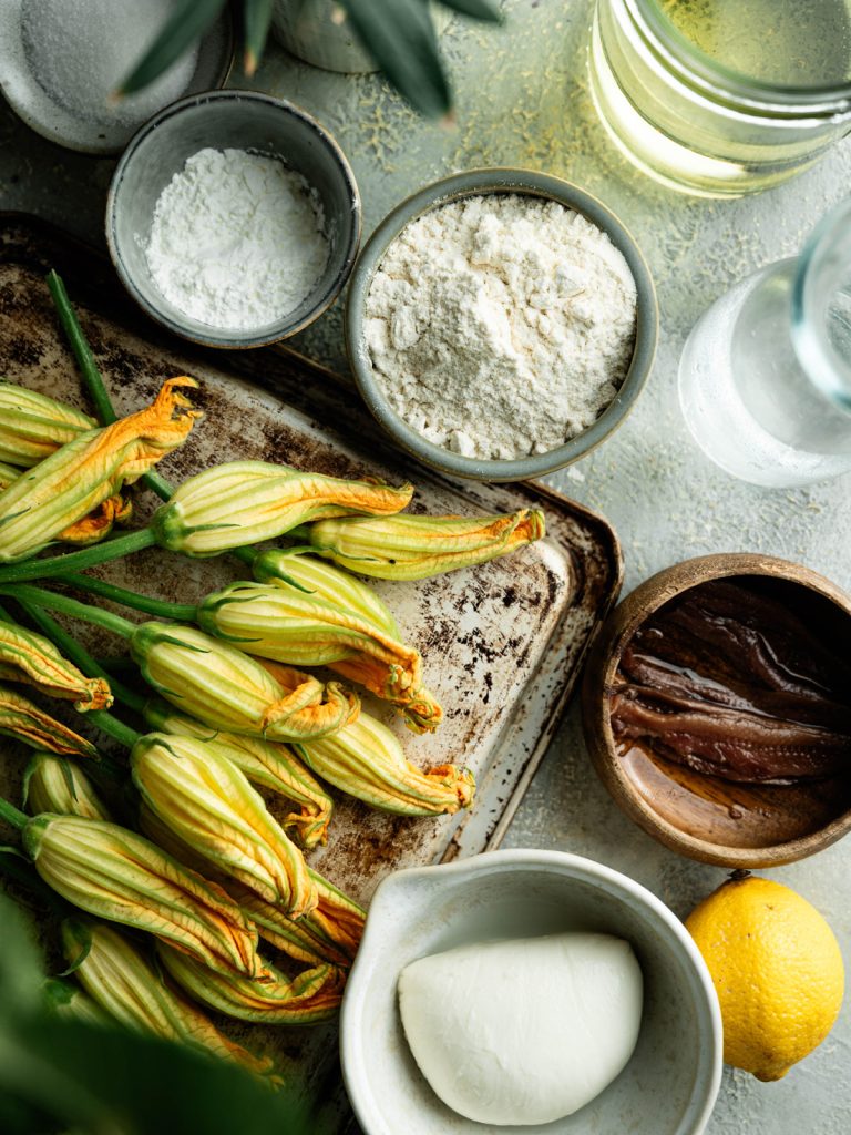Zucchini blossoms with mozzarella, anchovies, lemon, flour, starch, and sparkling water